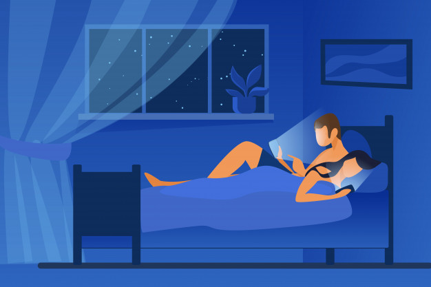 pareja acostada cama usando telefonos movil insomnio 2 ¿Qué tal duermes?